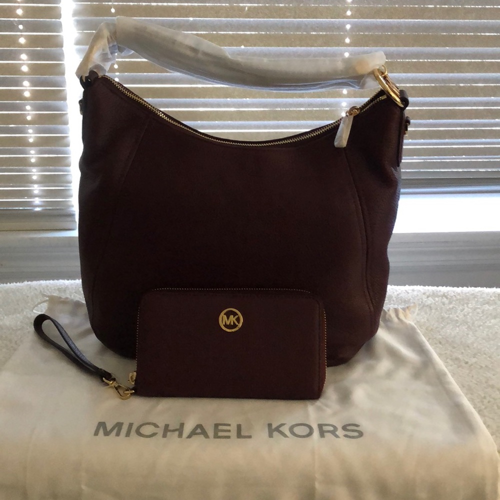 Michael Kors burgundy bag with matching wallet